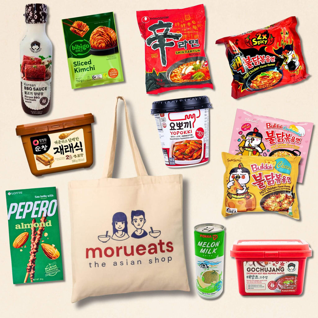 Assorted Korean food products including snacks and sauces with a 'morueats' tote bag in the center.